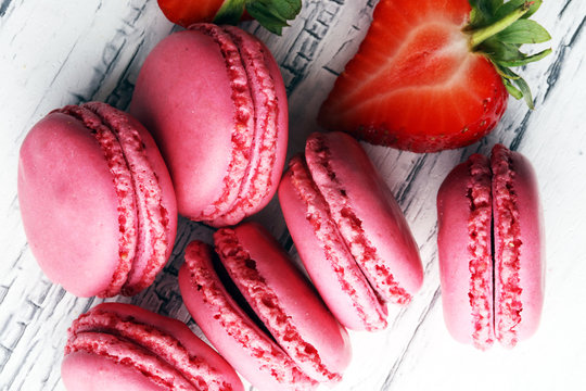Sweet and colourful french macaroons or macaron with strawberry