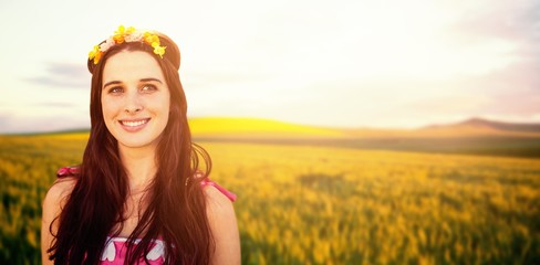 Composite image of beautiful woman with a flower crown