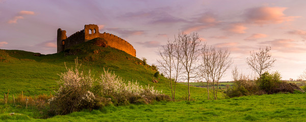 Sat on the Hill: another uncounted bath of light at sunset for that very Old Castle, Roche Castle,...