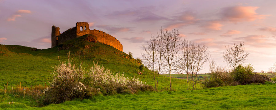 Sat on the Hill: another uncounted bath of light at sunset for that very Old Castle, Roche Castle, County Louth, Ireland