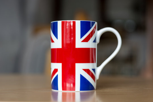 Great Britain flag on a mug close up with blurry background