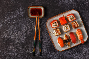 Sushi Set: sushi and sushi rolls on plate.