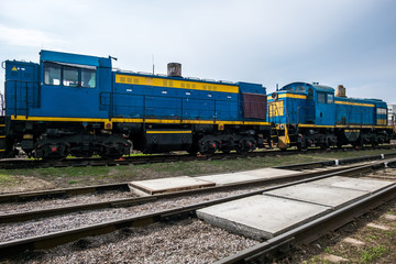 big russian locomotive in the repair workshop for old trains