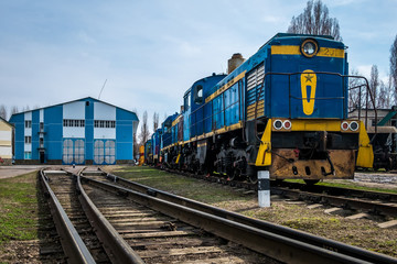 Fototapeta na wymiar big russian locomotive in the repair workshop for old trains
