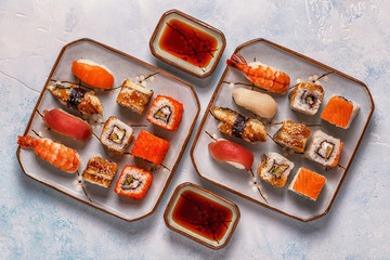 Sushi Set: sushi and sushi rolls on plate.