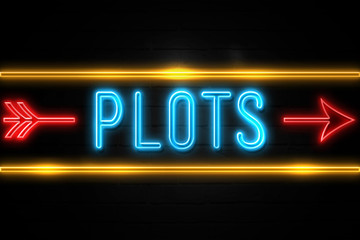 Plots  - fluorescent Neon Sign on brickwall Front view