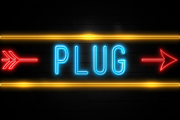 Plug  - fluorescent Neon Sign on brickwall Front view