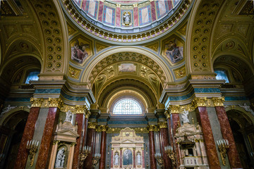 Fototapeta na wymiar BUDAPEST, HUNGARY Interior of St. Stephen's Basilica in Budapest, Hungary. The Basilica is named in honor of Stephen - first King of Hungary. Low light image