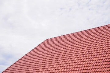 roof tiles patterns with blue sky and clouds