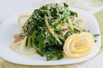 Chuka green salad with lemon and greens