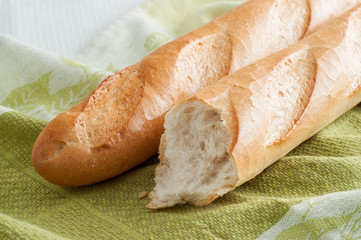 french white long baguette bread on a table