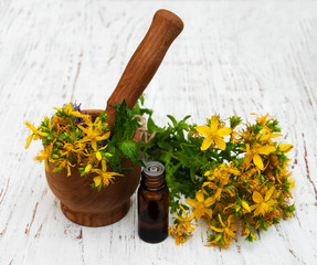 Tutsan flowers  and mortar