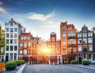 Beautiful tranquil sunset view of Amsterdam. - obrazy, fototapety, plakaty