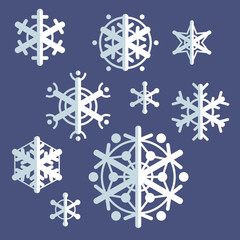 Collection of flat style vector snowflakes. Set of winter icons.