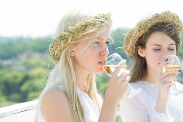 Girls with champagne glasses outdoors