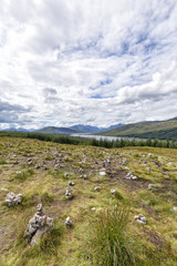 Fototapeta premium Small Cairns on the roadside near Loch Loyne, Scotland.