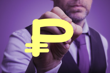 businessman draws Russian ruble