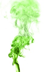 Obraz na płótnie Canvas green smoke on a white background,Abstract green smoke swirls over white background, fire smoke