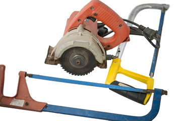 Fototapeta premium unior hacksaw with orange and yellow plastic handle isolated on white , Electric iron cutting machine