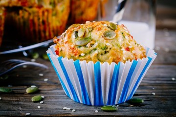 muffins with spinach,  feta cheese pumpkin seeds and sesame seeds