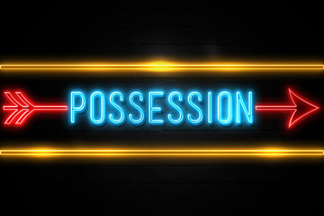 Possession  - fluorescent Neon Sign on brickwall Front view
