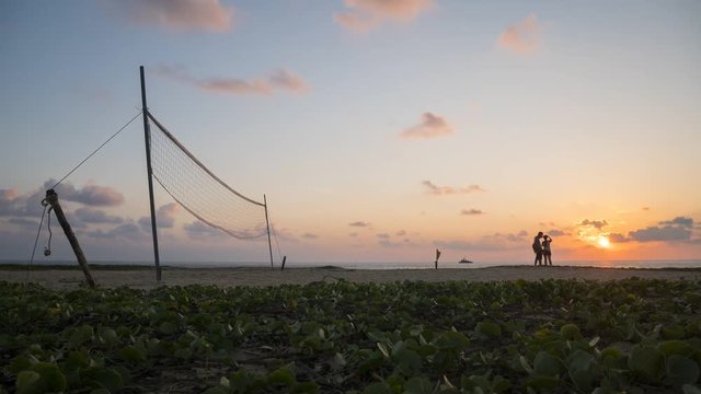 4K Time - Lapse Volleyball net on the beach with beautiful sunset in sport concept