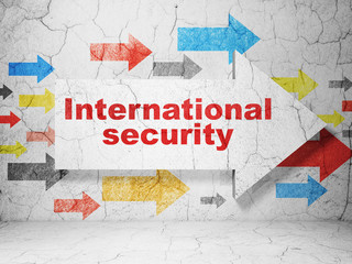 Safety concept: arrow with International Security on grunge wall background