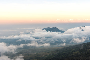 Sunset above the mountain and cloud at Mount Rinjani, Lombok Island, Indonesia.