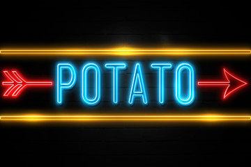 Potato  - fluorescent Neon Sign on brickwall Front view