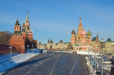 Winter view of the Kremlin, Vasilevsky descent and the Pokrovsky Cathedral (temple of Vasily the blessed) in Moscow, Russia
