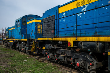 big russian locomotive in the repair workshop for old trains