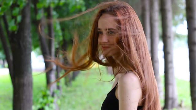 Portrait of beautiful young woman with long hair.