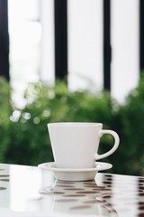 Hot coffee cup in cafe.