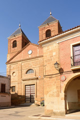 Fototapeta na wymiar El Salvador church and town hall in Villanueva del Campo, Tierra de Campos Region, Zamora province, Castilla y Leon, Spain