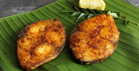 King Fish fry on banana leaf, selective focus