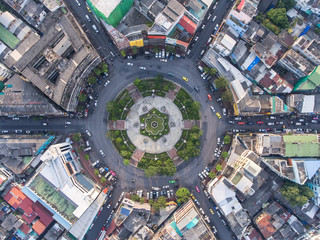 Aerial view, Road roundabout, Expressway with car lots in the city in Thailand.  beautiful Street , downtown, cityscape, Top view. Background