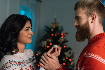 happy couple with candle