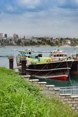 Fototapeta premium Boat loaded with bags in the port of Mombasa