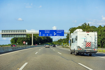 Caravan or recreational vehicle motor home trailer on a freeway road