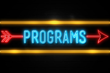 Programs  - fluorescent Neon Sign on brickwall Front view