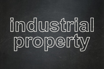 Obraz premium Law concept: Industrial Property on chalkboard background