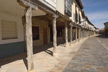 Street with arcades in Ampudia, Tierra de Campos region, Palenciia province, Castilla y Leon, Spain
