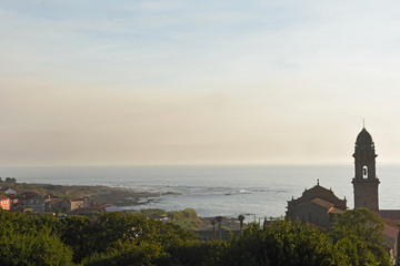 Fototapeta na wymiar Sunset at Monastery of Santa Maria de Oia, Pontevedra province, Galica, Spain