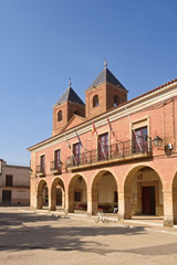 Fototapeta na wymiar El Salvador church and town hall in Villanueva del Campo, Tierra de Campos Region, Zamora province, Castilla y Leon, Spain