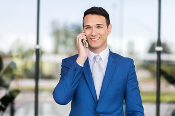 Young manager on the phone