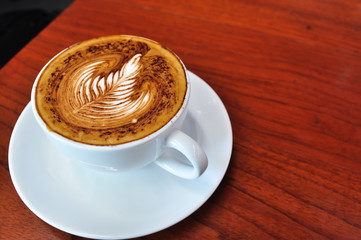 white cup of hot coffee