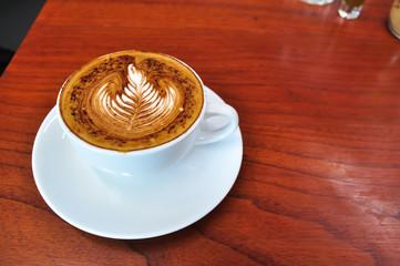 white cup of hot coffee