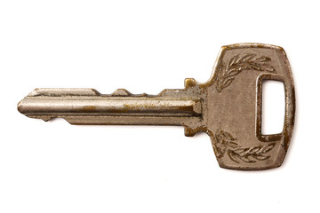 Old key on a white background.