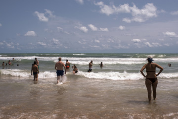 People bathing on the beach