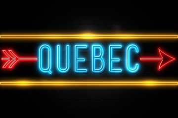 Quebec  - fluorescent Neon Sign on brickwall Front view